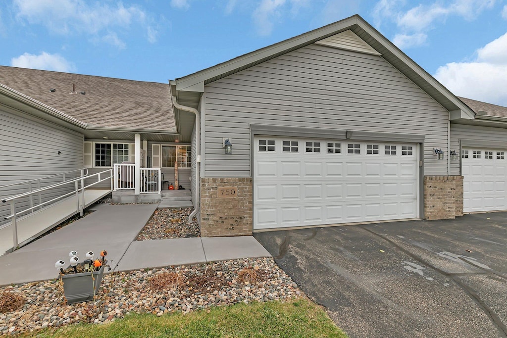 view of front of property featuring a garage