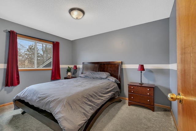 bedroom featuring light colored carpet