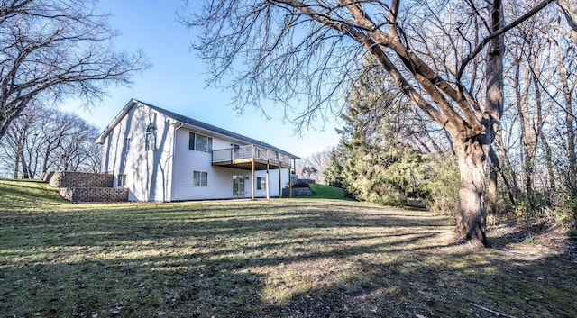 exterior space with a yard and a deck