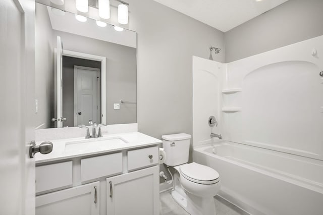 full bathroom featuring shower / bathing tub combination, vanity, and toilet