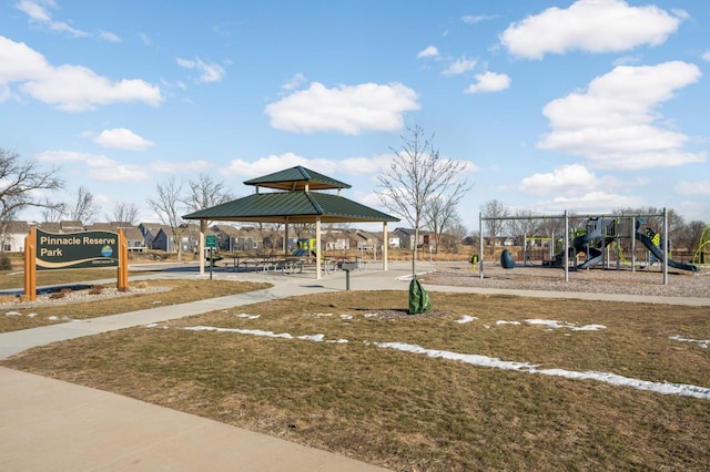 view of jungle gym featuring a gazebo and a lawn