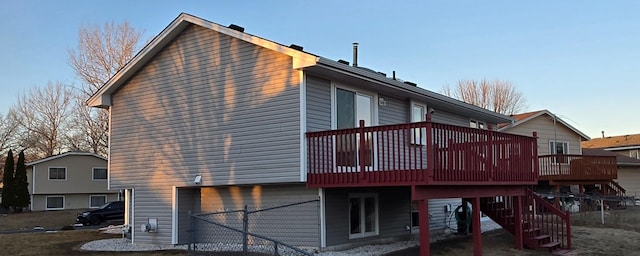 rear view of house with a deck