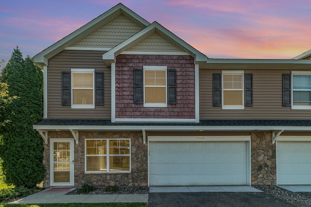 craftsman inspired home featuring a garage