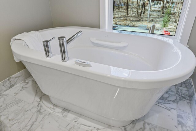 room details featuring a freestanding tub
