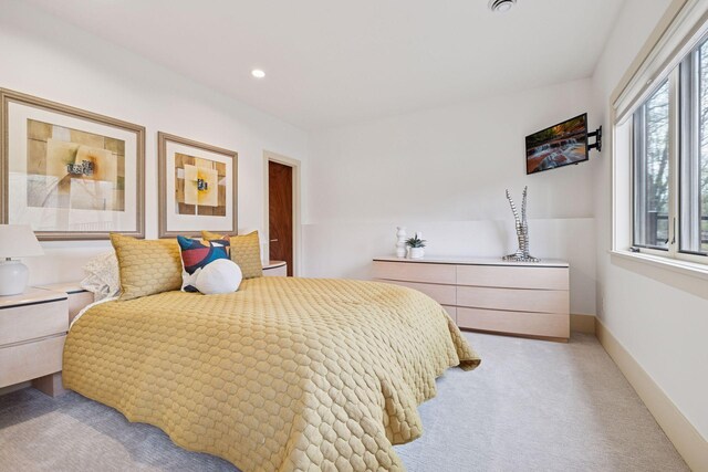 bedroom featuring recessed lighting and light colored carpet