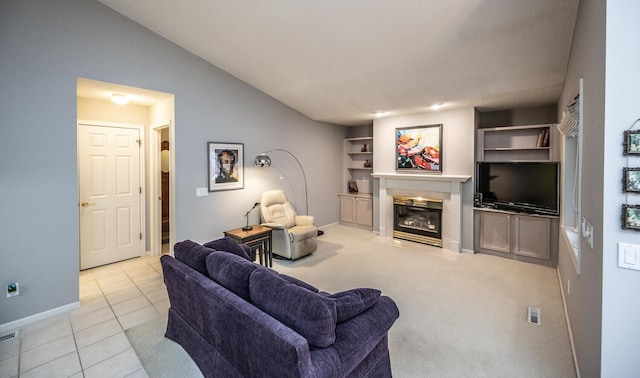 tiled living room featuring lofted ceiling