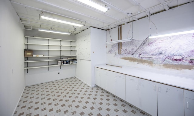 interior space featuring white cabinetry