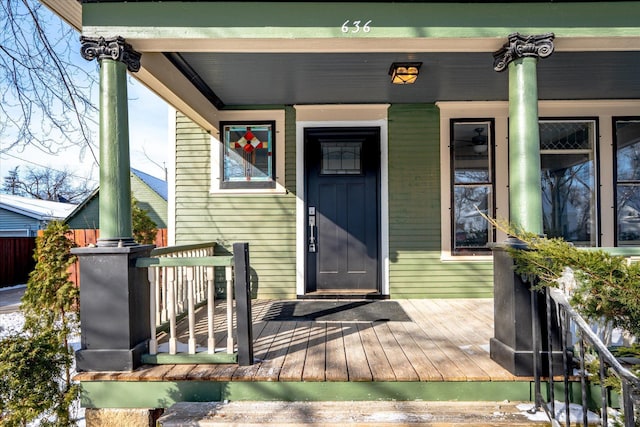 doorway to property with a porch