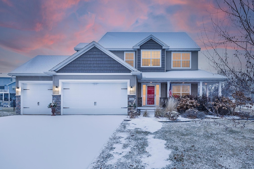 view of front of property featuring a garage