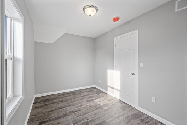 bonus room featuring dark hardwood / wood-style flooring