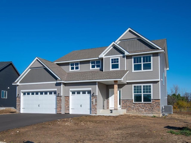 craftsman inspired home with central AC and a garage