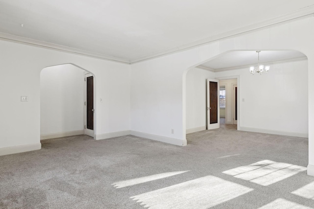 unfurnished room featuring crown molding, light carpet, and a notable chandelier