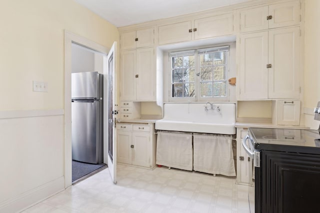 kitchen with appliances with stainless steel finishes and sink