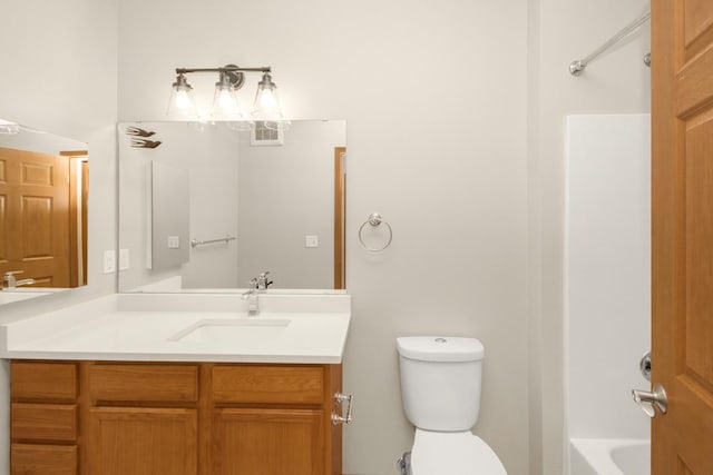 full bathroom featuring vanity, toilet, and shower / bath combination