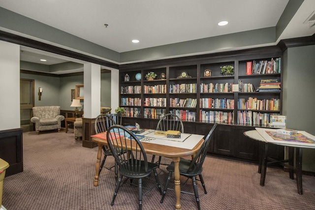 interior space with built in shelves and carpet floors