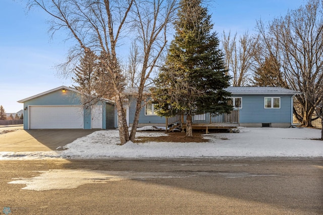 view of front of property featuring a garage and a wooden deck