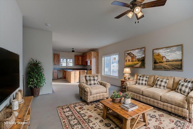 living room featuring ceiling fan