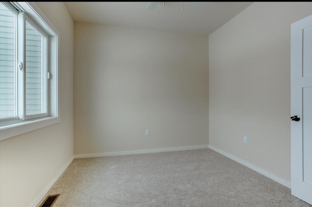 view of carpeted spare room