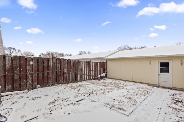 view of yard covered in snow