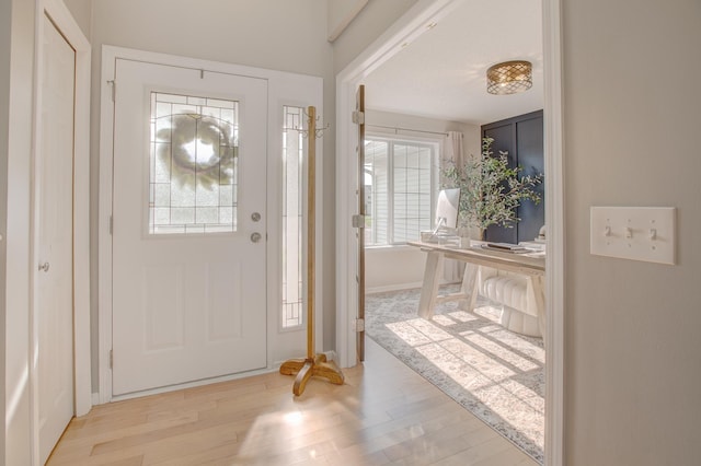 entrance foyer featuring light hardwood / wood-style floors