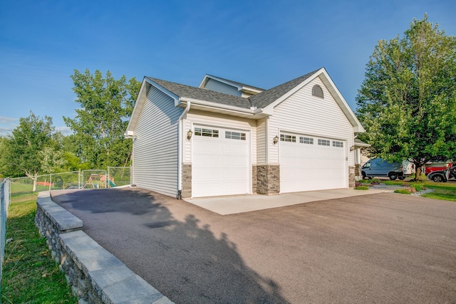 view of property exterior with a garage