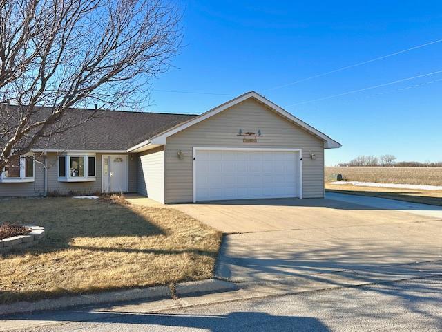 ranch-style home with a garage