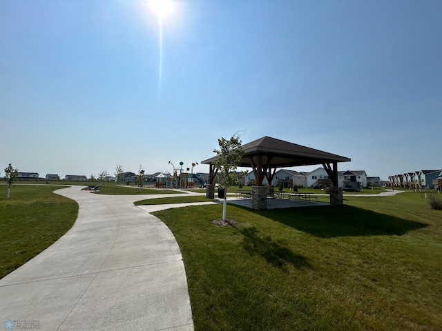 view of home's community featuring a gazebo and a yard