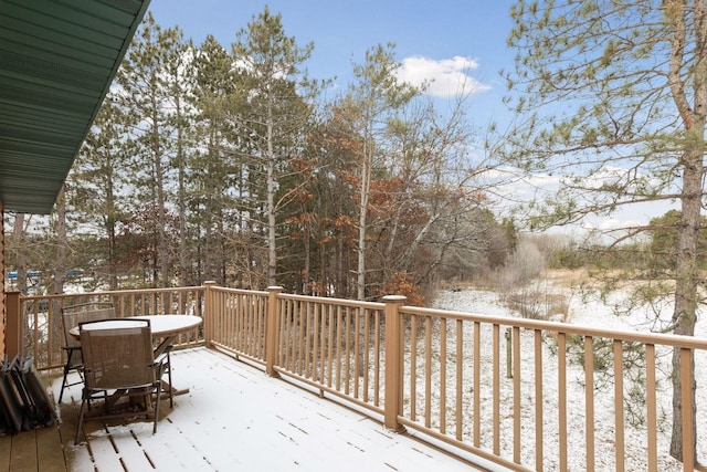 view of snow covered deck