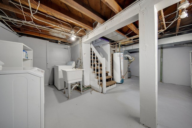 unfinished below grade area with stairs, water heater, washer and clothes dryer, and a sink