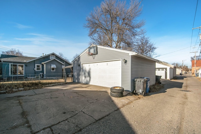 detached garage with fence