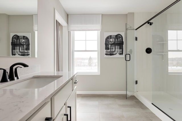 bathroom with vanity and walk in shower