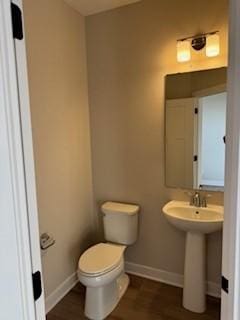 bathroom featuring toilet