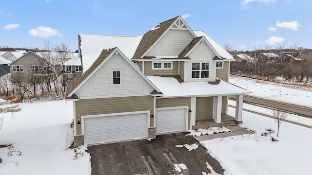 craftsman house featuring a garage