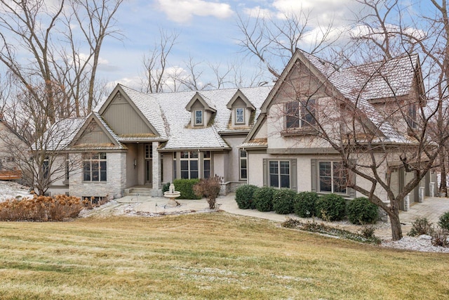 view of front of home with a front yard