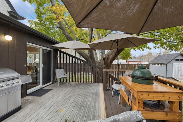 wooden terrace with a storage unit