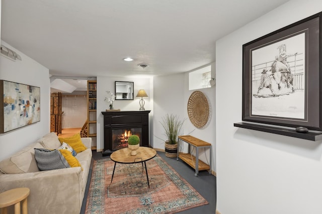 living room featuring concrete floors