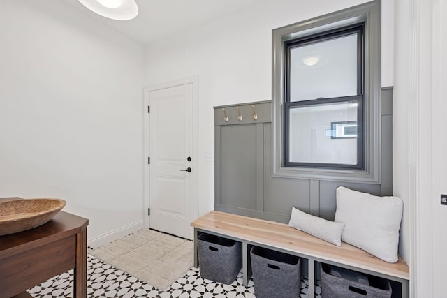 mudroom featuring baseboards