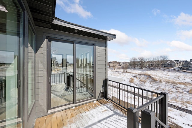 view of snow covered deck