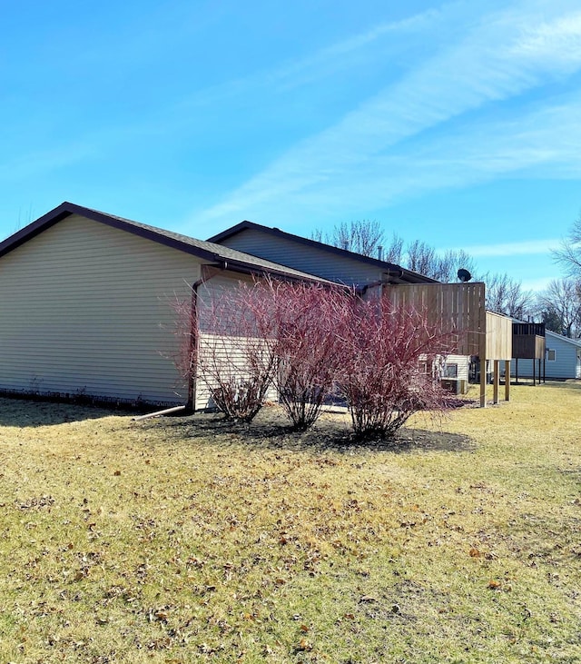 2402 Kenwood Dr SW, Willmar, MN 56201 - view of home's exterior featuring a yard