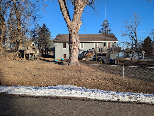 view of front of home featuring a wooden deck