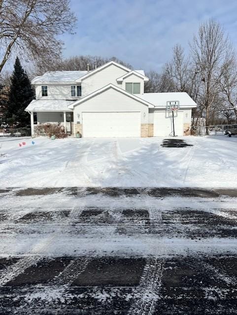 view of front of property with a garage