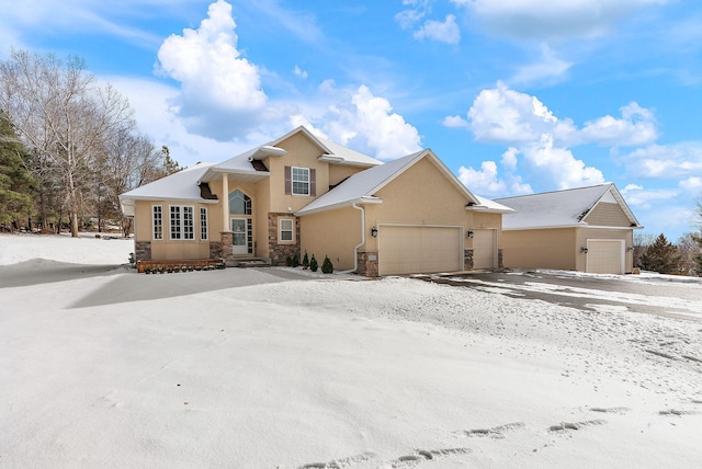 view of front of home with a garage