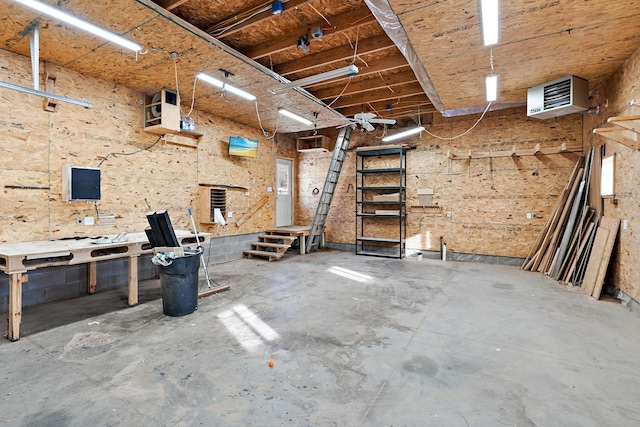 basement with a workshop area