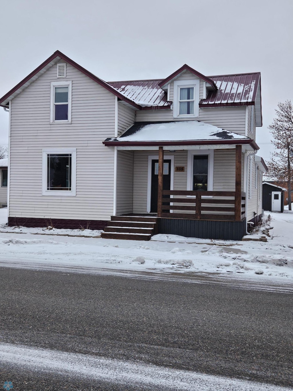 view of front of home featuring covered porch