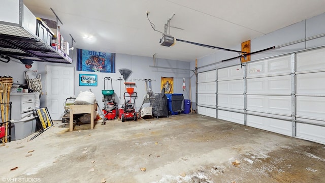 garage featuring a garage door opener