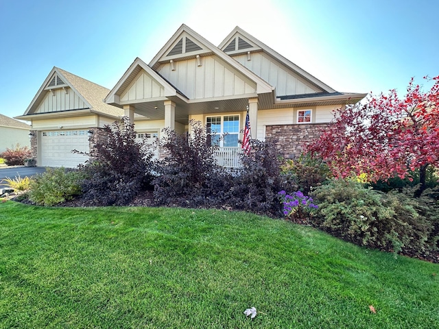 craftsman house featuring a porch, board and batten siding, and a front yard