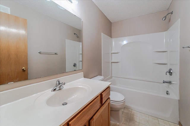 full bathroom with vanity, toilet, shower / tub combination, and a textured ceiling