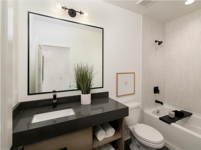 full bathroom featuring visible vents, shower / tub combination, vanity, and toilet