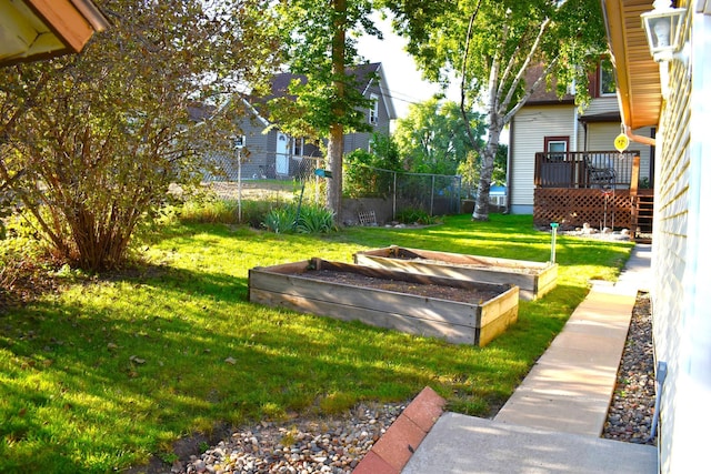 view of yard with a wooden deck