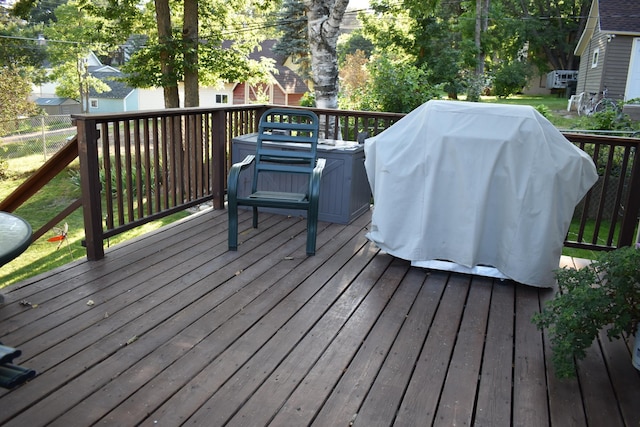 wooden deck featuring grilling area